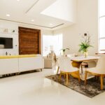 About Modern interior of modern living room with second level space in minimalistic design in white color with wooden elements